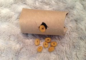 A toilet paper roll food puzzle.